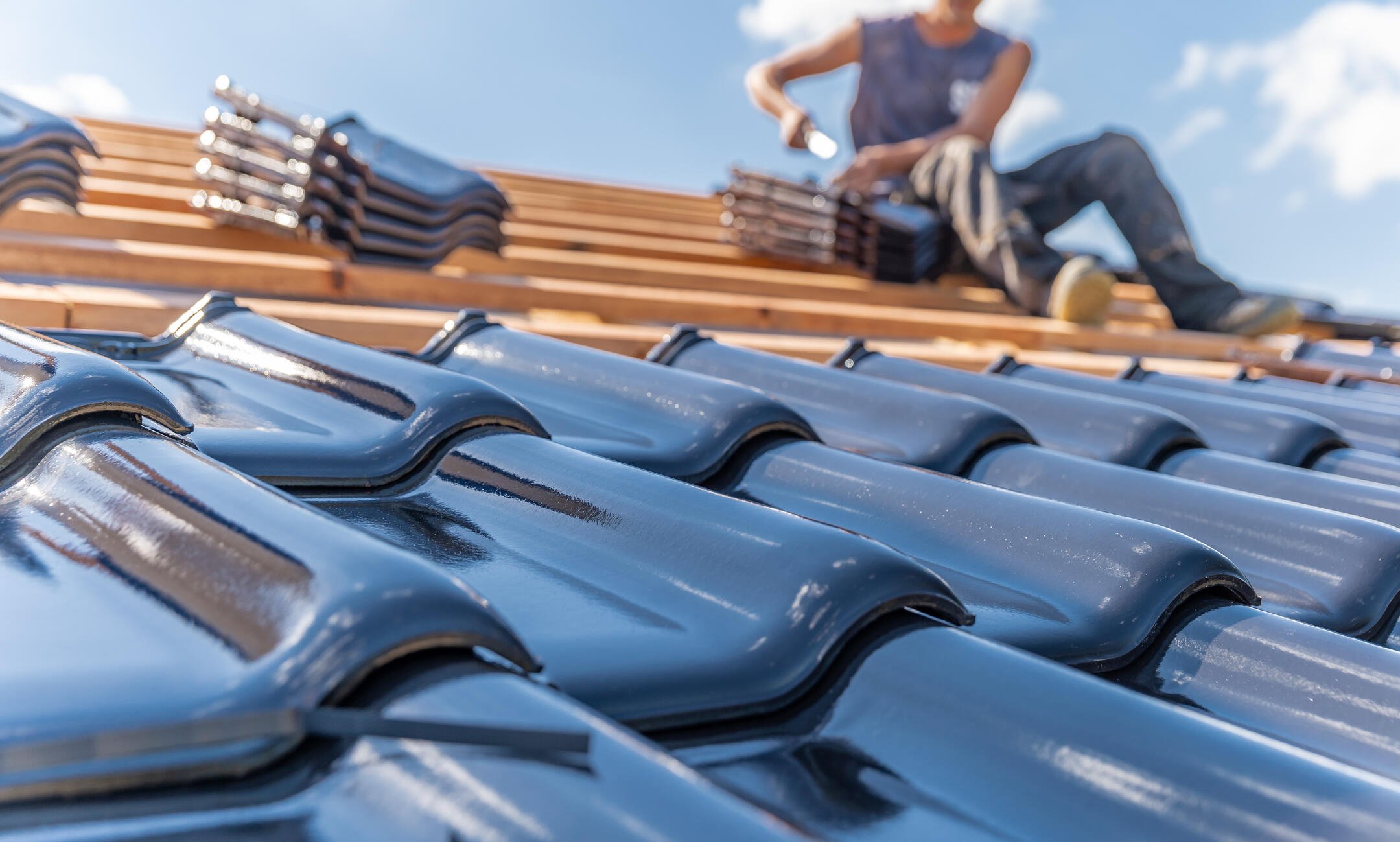 Close-up of roof tiles installation